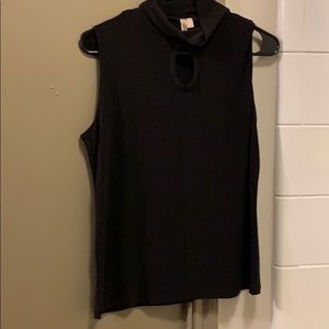Black sleeveless top with cutout